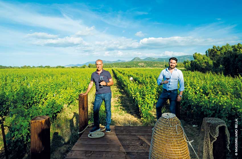 Sardinia-Sulcis Iglesiente-Franco Rubiu and his son Roberto of the Rubiu Winery-vineyard