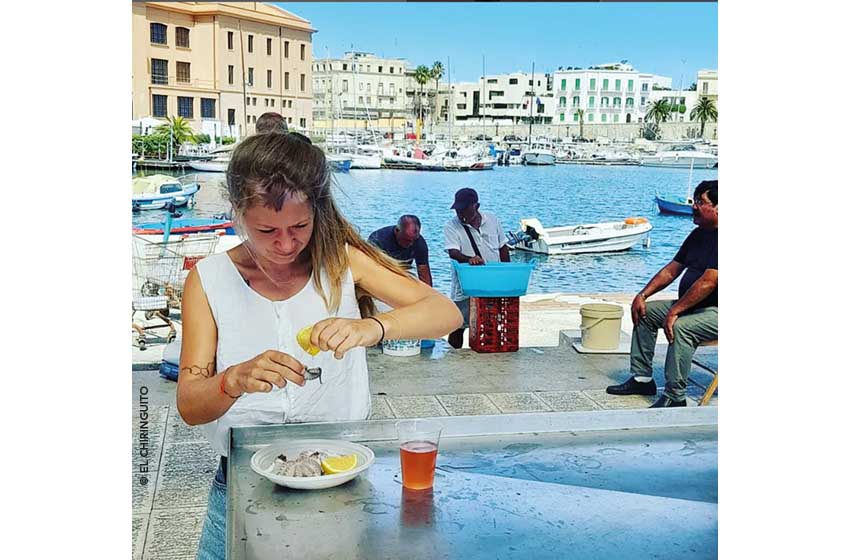 Puglia-Bari-El Chiringuito-ragazza con polpo-Ph. El Chiringuito